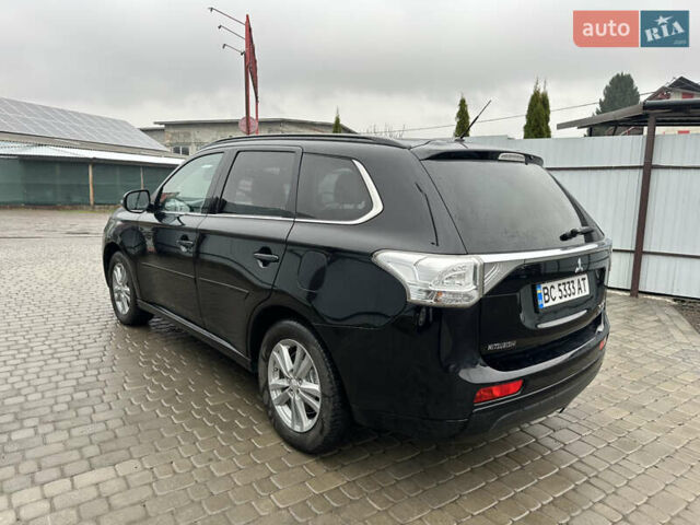 Черный Мицубиси Аутлендер, объемом двигателя 2 л и пробегом 223 тыс. км за 13400 $, фото 7 на Automoto.ua