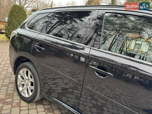 Черный Мицубиси Аутлендер, объемом двигателя 2 л и пробегом 173 тыс. км за 15299 $, фото 15 на Automoto.ua