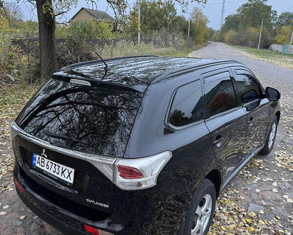 Чорний Міцубісі Аутлендер, об'ємом двигуна 2.4 л та пробігом 277 тис. км за 12800 $, фото 5 на Automoto.ua
