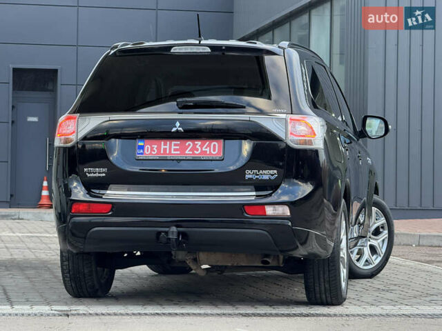 Чорний Міцубісі Аутлендер, об'ємом двигуна 2 л та пробігом 157 тис. км за 15299 $, фото 39 на Automoto.ua