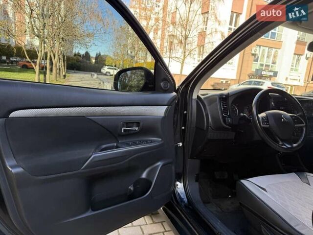 Черный Мицубиси Аутлендер, объемом двигателя 2.4 л и пробегом 270 тыс. км за 12500 $, фото 17 на Automoto.ua