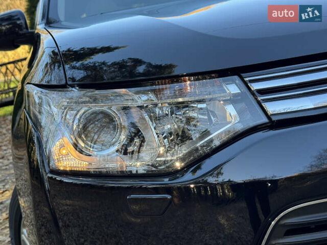 Чорний Міцубісі Аутлендер, об'ємом двигуна 2 л та пробігом 173 тис. км за 15299 $, фото 7 на Automoto.ua