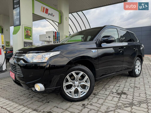 Чорний Міцубісі Аутлендер, об'ємом двигуна 2 л та пробігом 157 тис. км за 15299 $, фото 29 на Automoto.ua