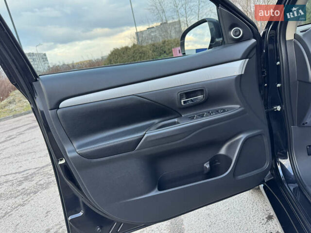 Чорний Міцубісі Аутлендер, об'ємом двигуна 2 л та пробігом 157 тис. км за 15299 $, фото 67 на Automoto.ua