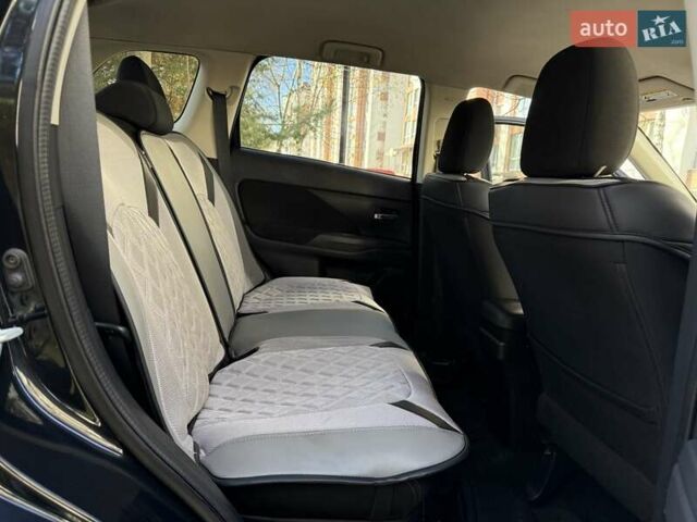 Черный Мицубиси Аутлендер, объемом двигателя 2.4 л и пробегом 270 тыс. км за 12500 $, фото 29 на Automoto.ua