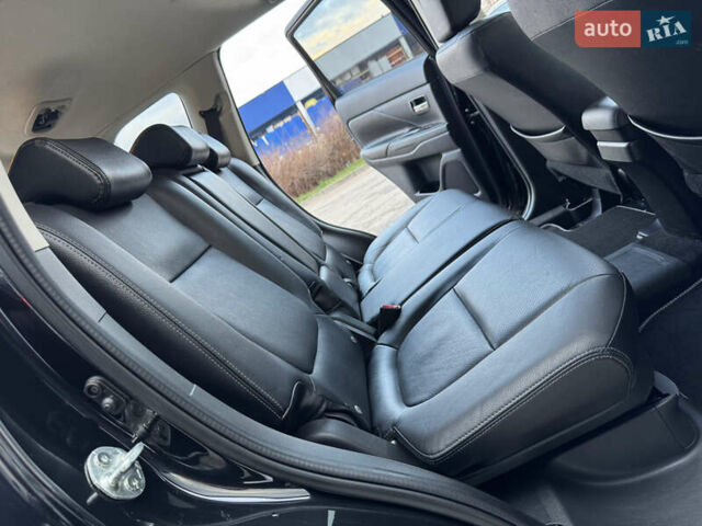 Чорний Міцубісі Аутлендер, об'ємом двигуна 2 л та пробігом 157 тис. км за 15299 $, фото 100 на Automoto.ua