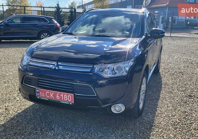 Чорний Міцубісі Аутлендер, об'ємом двигуна 2 л та пробігом 237 тис. км за 13800 $, фото 11 на Automoto.ua