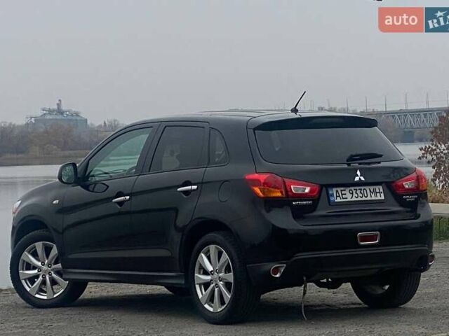 Чорний Міцубісі Аутлендер, об'ємом двигуна 2 л та пробігом 250 тис. км за 10800 $, фото 8 на Automoto.ua