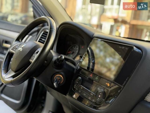 Черный Мицубиси Аутлендер, объемом двигателя 2.4 л и пробегом 270 тыс. км за 12500 $, фото 27 на Automoto.ua