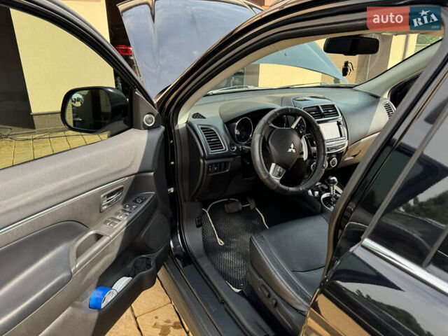 Чорний Міцубісі Аутлендер, об'ємом двигуна 2 л та пробігом 211 тис. км за 9500 $, фото 5 на Automoto.ua