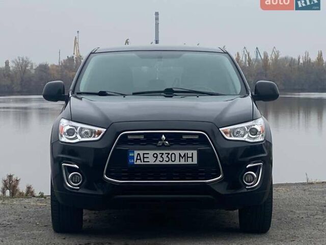 Чорний Міцубісі Аутлендер, об'ємом двигуна 2 л та пробігом 250 тис. км за 10800 $, фото 4 на Automoto.ua
