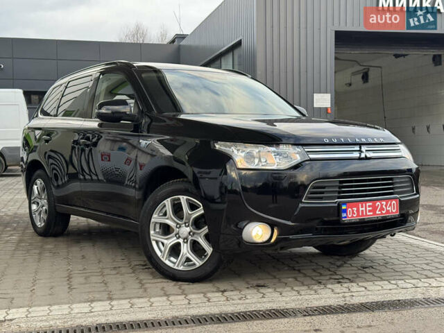 Чорний Міцубісі Аутлендер, об'ємом двигуна 2 л та пробігом 157 тис. км за 15299 $, фото 3 на Automoto.ua