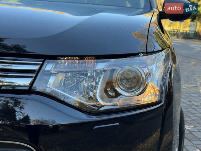 Чорний Міцубісі Аутлендер, об'ємом двигуна 2 л та пробігом 173 тис. км за 15299 $, фото 31 на Automoto.ua