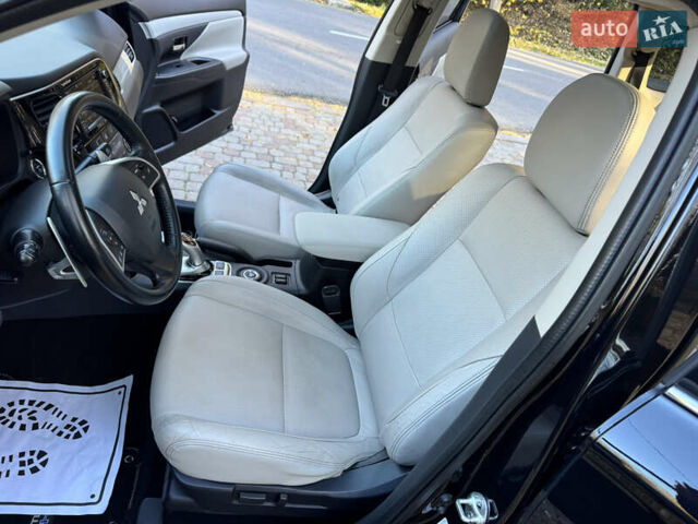 Чорний Міцубісі Аутлендер, об'ємом двигуна 2 л та пробігом 173 тис. км за 15299 $, фото 79 на Automoto.ua