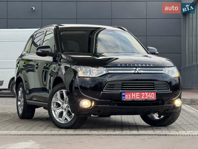 Чорний Міцубісі Аутлендер, об'ємом двигуна 2 л та пробігом 157 тис. км за 15299 $, фото 1 на Automoto.ua