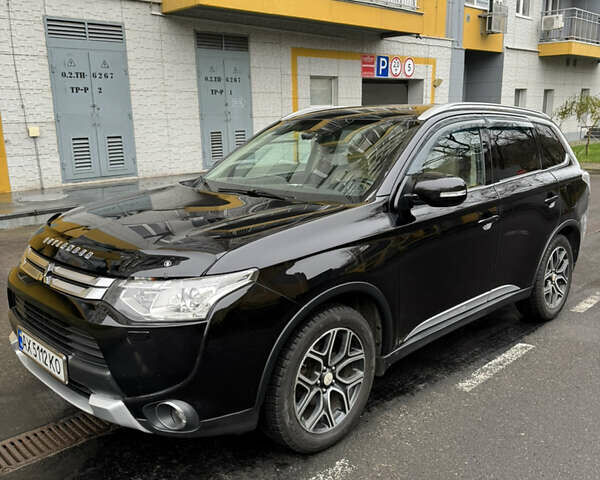 Черный Мицубиси Аутлендер, объемом двигателя 2.27 л и пробегом 244 тыс. км за 14000 $, фото 7 на Automoto.ua