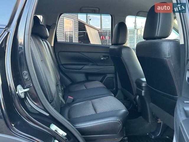 Чорний Міцубісі Аутлендер, об'ємом двигуна 2.4 л та пробігом 199 тис. км за 12800 $, фото 28 на Automoto.ua