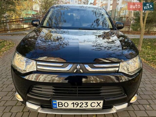 Черный Мицубиси Аутлендер, объемом двигателя 2.4 л и пробегом 270 тыс. км за 12500 $, фото 13 на Automoto.ua