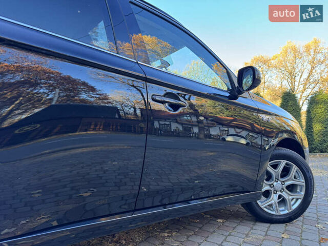 Чорний Міцубісі Аутлендер, об'ємом двигуна 2 л та пробігом 173 тис. км за 15299 $, фото 57 на Automoto.ua