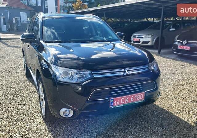 Чорний Міцубісі Аутлендер, об'ємом двигуна 2 л та пробігом 237 тис. км за 13800 $, фото 10 на Automoto.ua
