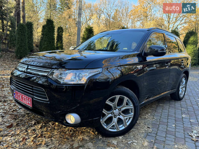 Чорний Міцубісі Аутлендер, об'ємом двигуна 2 л та пробігом 173 тис. км за 15299 $, фото 30 на Automoto.ua
