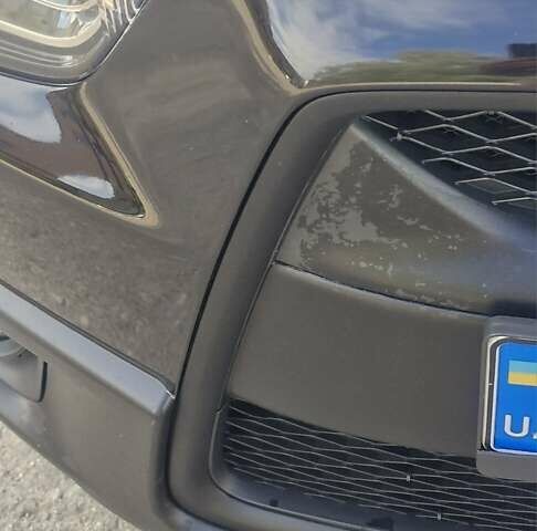 Чорний Міцубісі Аутлендер, об'ємом двигуна 2 л та пробігом 83 тис. км за 13500 $, фото 1 на Automoto.ua