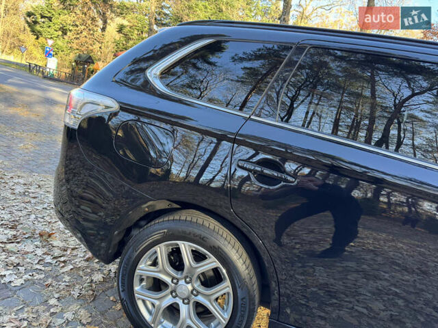 Чорний Міцубісі Аутлендер, об'ємом двигуна 2 л та пробігом 173 тис. км за 15299 $, фото 22 на Automoto.ua