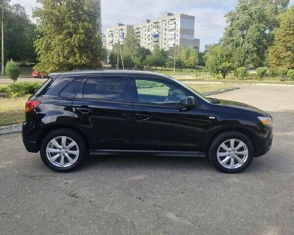 Чорний Міцубісі Аутлендер, об'ємом двигуна 2 л та пробігом 83 тис. км за 13500 $, фото 4 на Automoto.ua