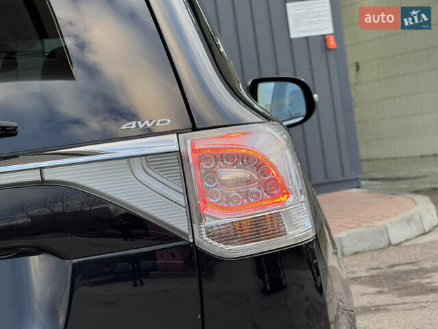 Чорний Міцубісі Аутлендер, об'ємом двигуна 2 л та пробігом 157 тис. км за 15299 $, фото 44 на Automoto.ua