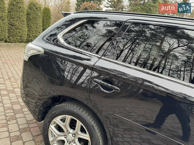 Черный Мицубиси Аутлендер, объемом двигателя 2 л и пробегом 173 тыс. км за 15299 $, фото 16 на Automoto.ua