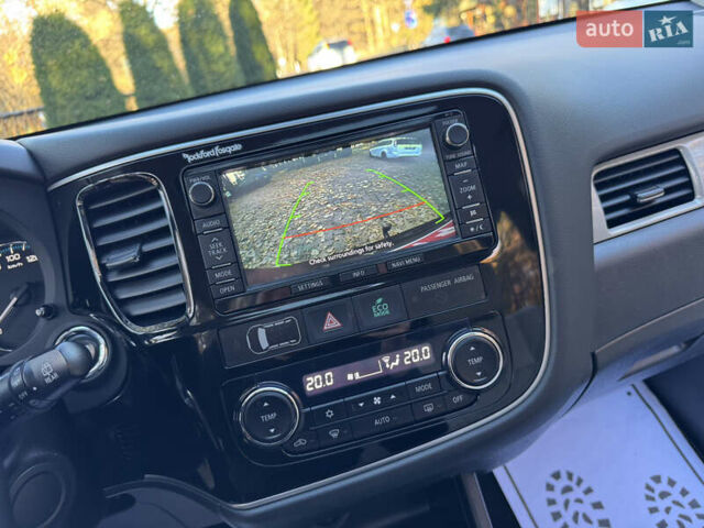 Чорний Міцубісі Аутлендер, об'ємом двигуна 2 л та пробігом 173 тис. км за 15299 $, фото 90 на Automoto.ua