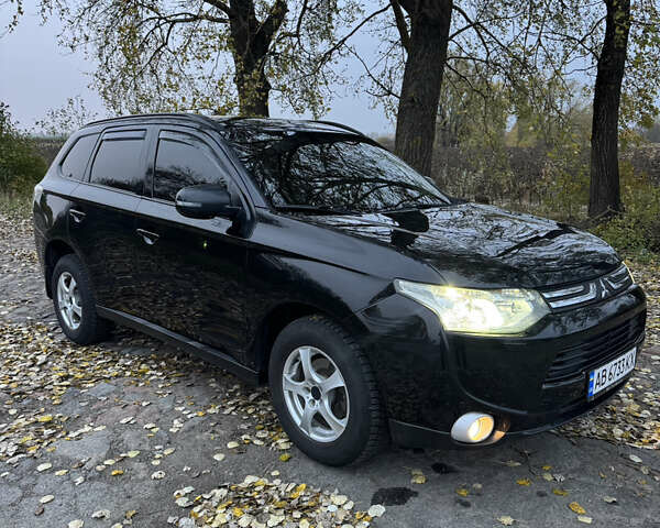 Чорний Міцубісі Аутлендер, об'ємом двигуна 2.4 л та пробігом 277 тис. км за 12800 $, фото 10 на Automoto.ua