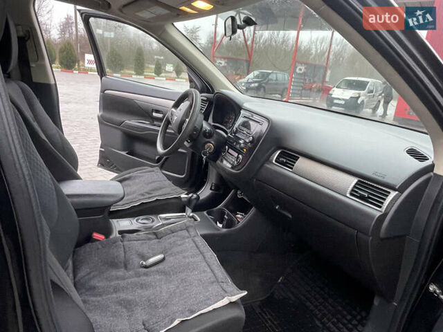 Чорний Міцубісі Аутлендер, об'ємом двигуна 2.4 л та пробігом 150 тис. км за 12200 $, фото 7 на Automoto.ua