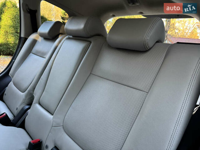 Чорний Міцубісі Аутлендер, об'ємом двигуна 2 л та пробігом 173 тис. км за 15299 $, фото 113 на Automoto.ua