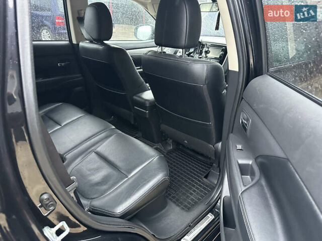 Черный Мицубиси Аутлендер, объемом двигателя 2 л и пробегом 223 тыс. км за 13400 $, фото 11 на Automoto.ua