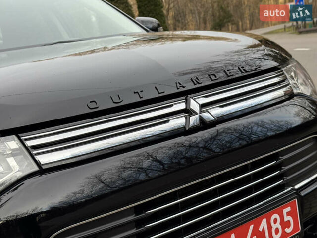 Черный Мицубиси Аутлендер, объемом двигателя 2 л и пробегом 173 тыс. км за 15299 $, фото 8 на Automoto.ua