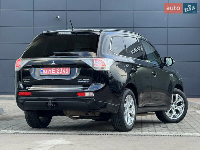 Чорний Міцубісі Аутлендер, об'ємом двигуна 2 л та пробігом 157 тис. км за 15299 $, фото 37 на Automoto.ua