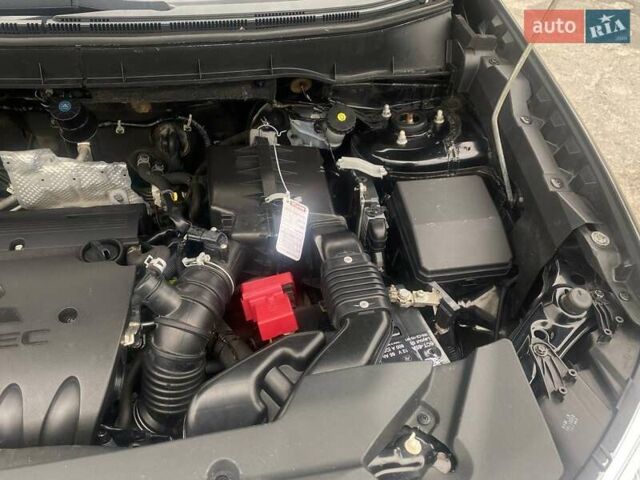 Чорний Міцубісі Аутлендер, об'ємом двигуна 2 л та пробігом 250 тис. км за 10800 $, фото 23 на Automoto.ua
