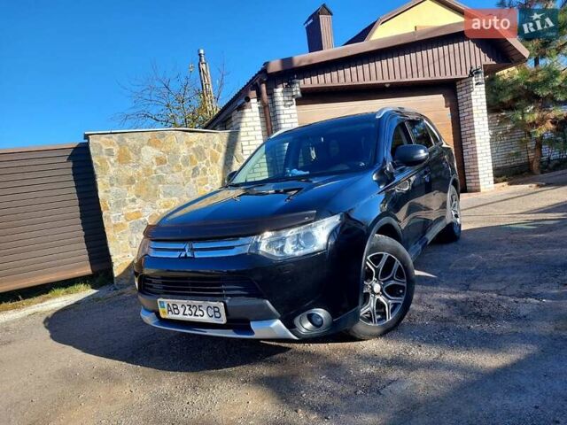 Черный Мицубиси Аутлендер, объемом двигателя 2.4 л и пробегом 183 тыс. км за 15000 $, фото 9 на Automoto.ua