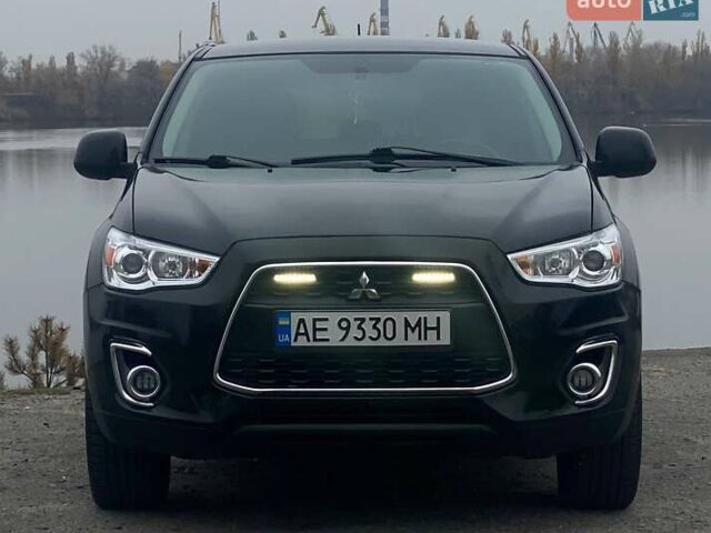 Чорний Міцубісі Аутлендер, об'ємом двигуна 2 л та пробігом 250 тис. км за 10800 $, фото 5 на Automoto.ua