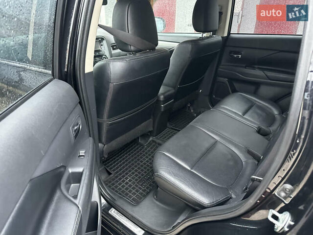 Черный Мицубиси Аутлендер, объемом двигателя 2 л и пробегом 223 тыс. км за 13400 $, фото 10 на Automoto.ua