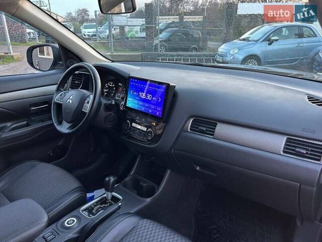 Чорний Міцубісі Аутлендер, об'ємом двигуна 2.4 л та пробігом 199 тис. км за 12800 $, фото 33 на Automoto.ua