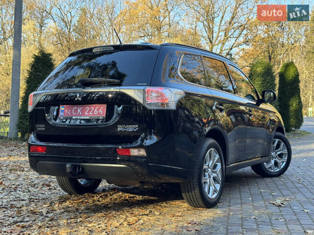 Чорний Міцубісі Аутлендер, об'ємом двигуна 2 л та пробігом 173 тис. км за 15299 $, фото 46 на Automoto.ua