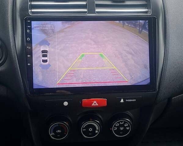 Чорний Міцубісі Аутлендер, об'ємом двигуна 2 л та пробігом 250 тис. км за 10800 $, фото 14 на Automoto.ua