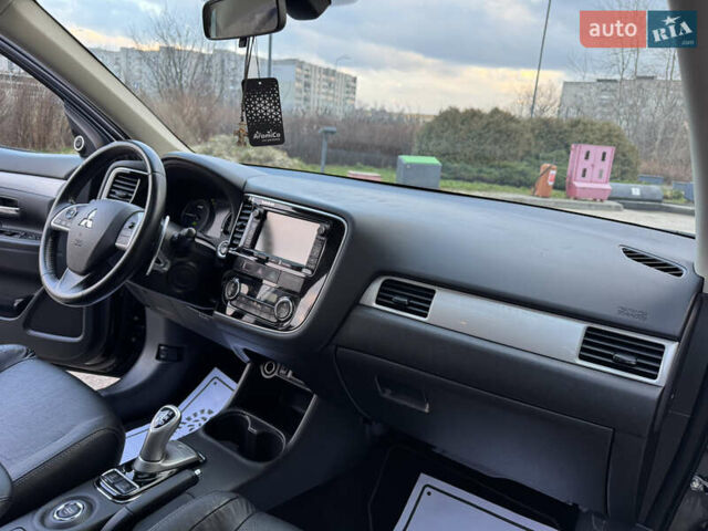 Чорний Міцубісі Аутлендер, об'ємом двигуна 2 л та пробігом 157 тис. км за 15299 $, фото 86 на Automoto.ua