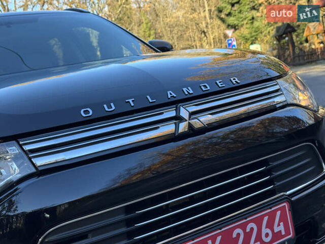 Чорний Міцубісі Аутлендер, об'ємом двигуна 2 л та пробігом 173 тис. км за 15299 $, фото 8 на Automoto.ua