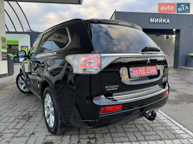Чорний Міцубісі Аутлендер, об'ємом двигуна 2 л та пробігом 157 тис. км за 15299 $, фото 61 на Automoto.ua