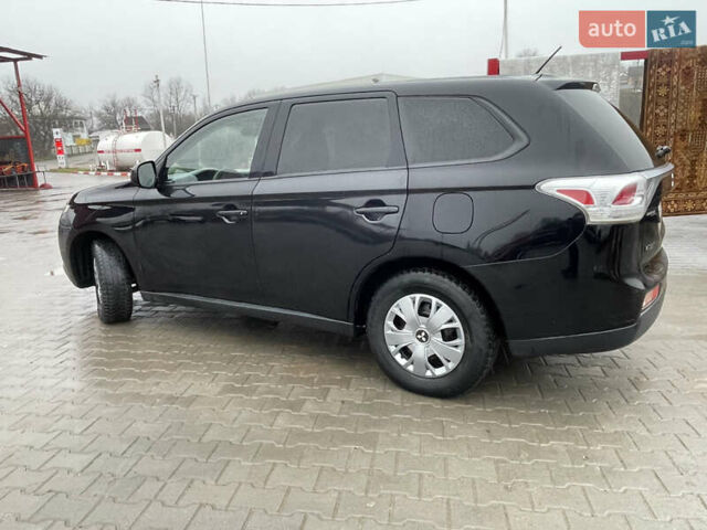Чорний Міцубісі Аутлендер, об'ємом двигуна 2.4 л та пробігом 150 тис. км за 12200 $, фото 4 на Automoto.ua