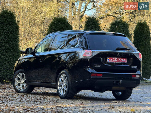 Чорний Міцубісі Аутлендер, об'ємом двигуна 2 л та пробігом 173 тис. км за 15299 $, фото 59 на Automoto.ua