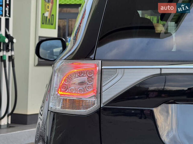Чорний Міцубісі Аутлендер, об'ємом двигуна 2 л та пробігом 157 тис. км за 15299 $, фото 59 на Automoto.ua